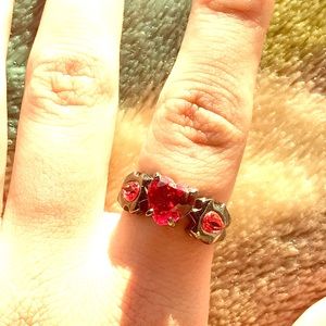 Ruby heart ring.